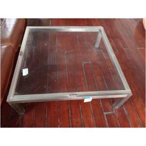Table basse en vitre avec cadre et pieds en acier inoxydable