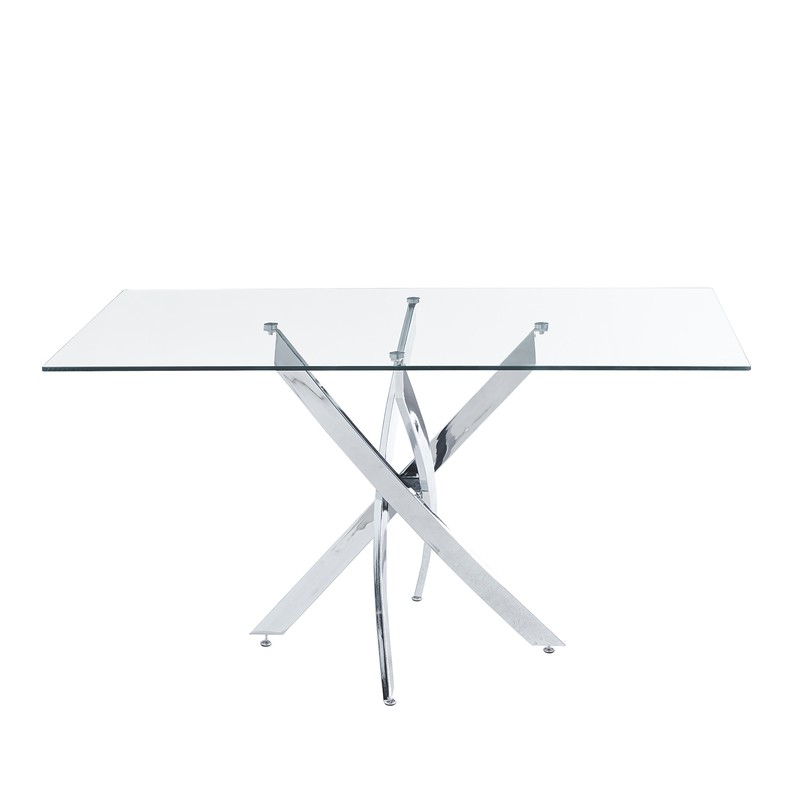 Ensemble table et chaises en acier utilisé dans un cadre extérieur sur une terrasse