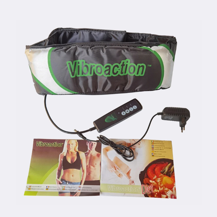 Appareil de massage vibrant Vibro Action posé sur une serviette blanche