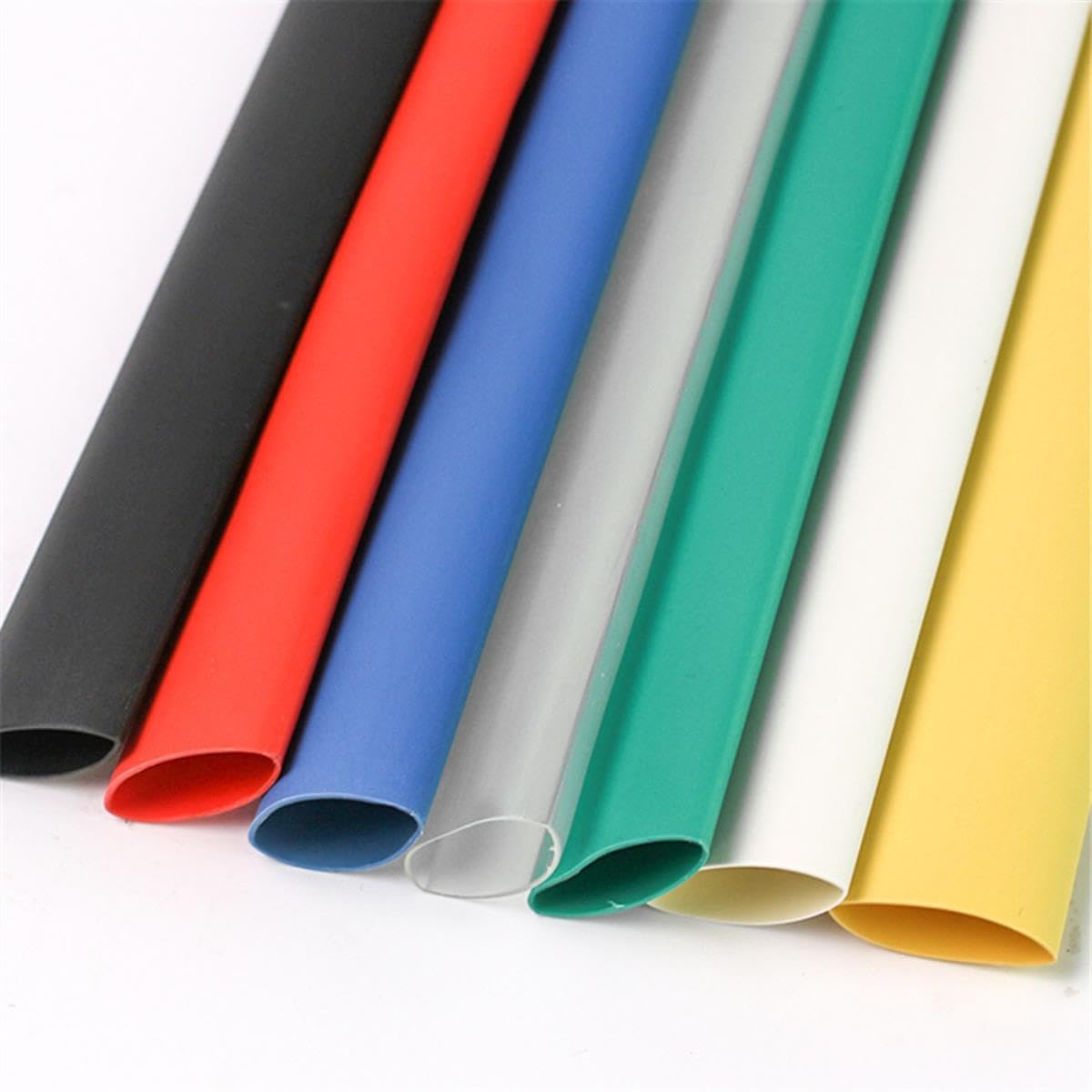 Tubes thermorétractables de couleur rouge et bleu enroulés