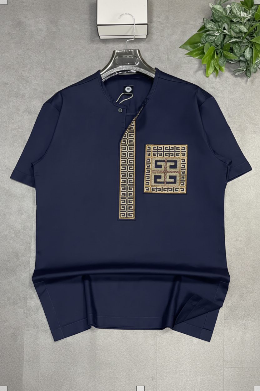 Détail de la broderie dorée artisanale sur la Chemise Afritudes Navy
